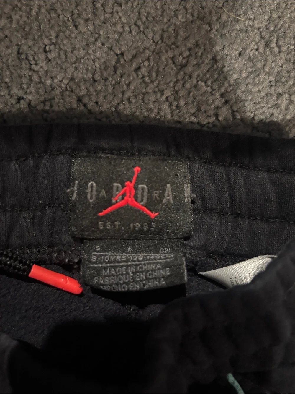 Nike Jordan black multi color logo sweat outfit with mini tear in right leg